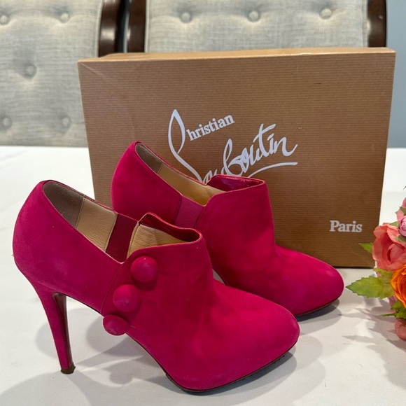 Authentic Christian Louboutin Fuxia C’est Moi Suede ankle boots